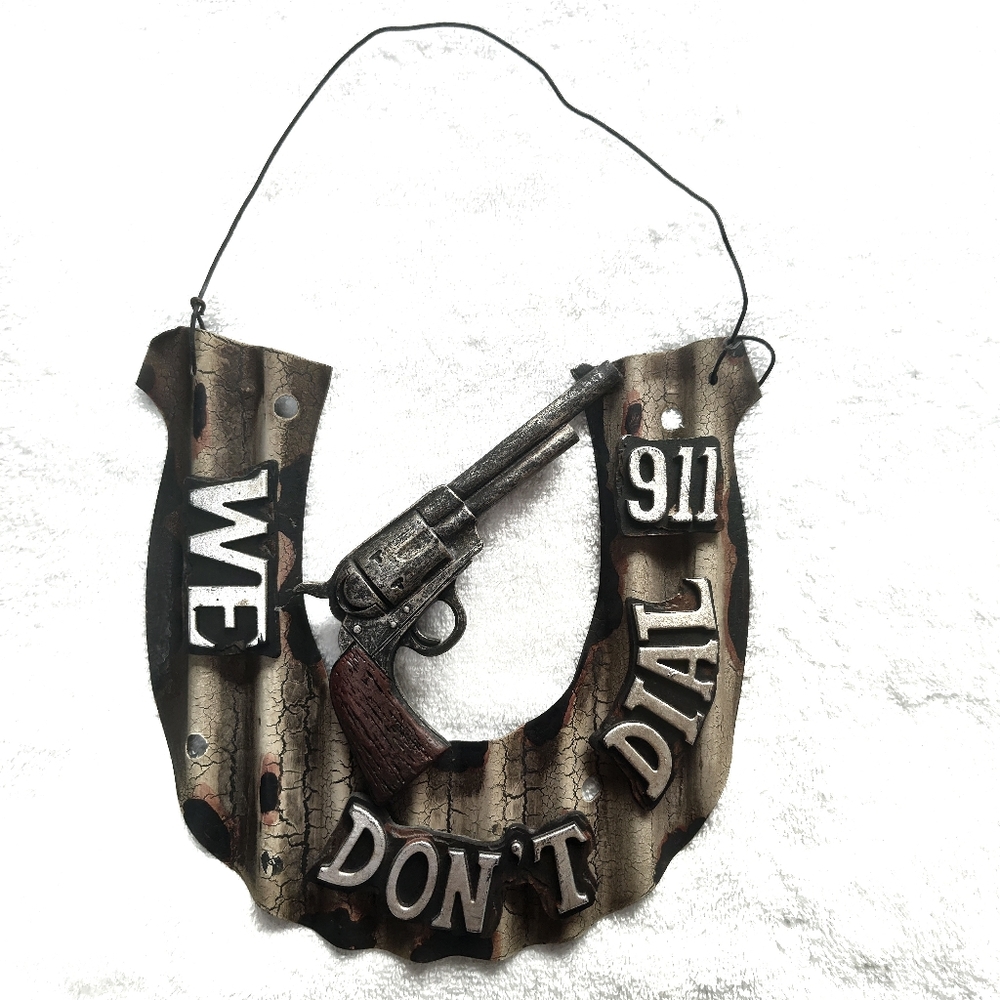 "We Don't Dial 911" wall hanging decor